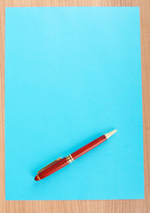 Paper background with pen