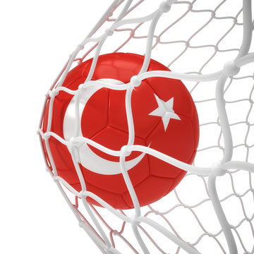 Turkish soccer ball inside the net