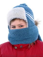 A boy in winter clothes with a face knotted scarf, isolated