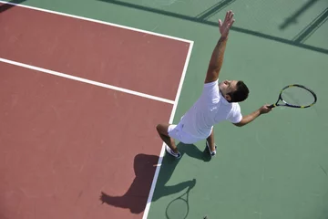 Zelfklevend Fotobehang young man play tennis © .shock