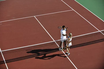 Foto op Canvas happy young couple play tennis game outdoor © .shock