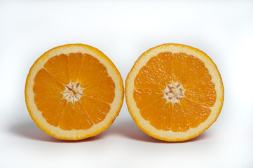Juicy enhalved oranges