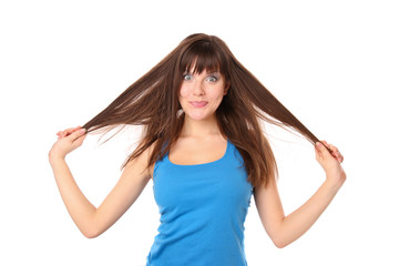 joyful and cheerful girl clings to her hair