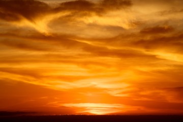 Cloudy sky at sunset or sunrise © AndreaGonzales