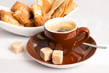 Black coffee with Italian crisp almond cookies cantuccini