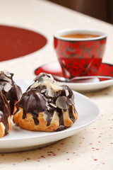 chocolate eclairs with coffee
