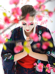 Artistic portrait of japan geisha woman with creative make-up ne