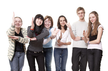 Obraz premium Group of teenagers pull hands that them have seen