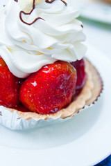 dessert fruit cake with strawberry on table