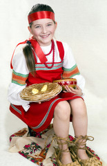 Russian girl national clothes and the big bast shoes