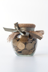 Glass jar with coins