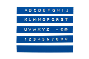 Embossed alphabet on blue plastic tape