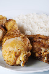 Roasted chicken legs with boiled rice