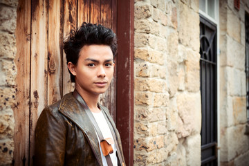 Young man resting outside