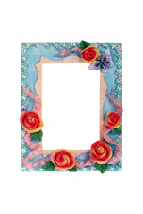 Photo frame with roses isolated on white