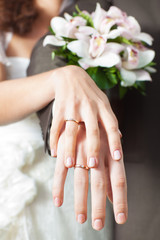 Hands with wedding rings