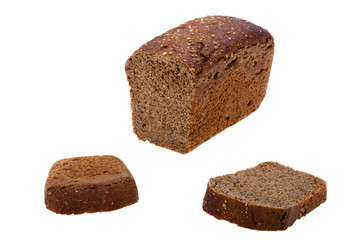Cutting black bread close up