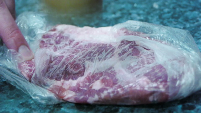Beating piece of fresh meat to make chops