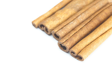 cinnamon sticks isolated on white