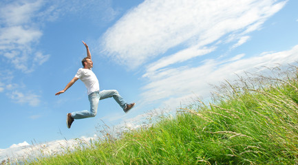 Man jumping on the meadow