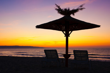 view of chairs and umbrellas on the beach