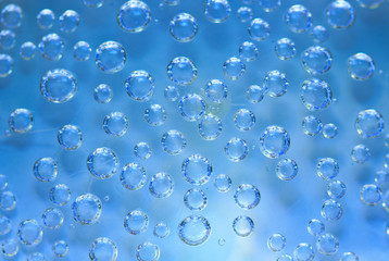 Underwater light and flowing bubbles, abstract background