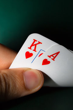 Hand holding winning cards