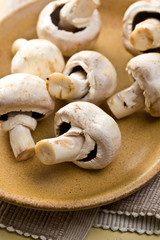button mushrooms on plate