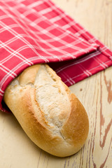 french baguette on wooden table