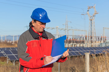 Engineer at Work In a Solar Power Station