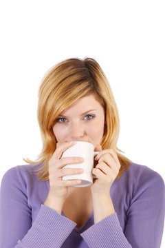 Young woman with a coffee mug (white background)