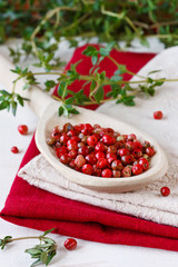 Pink peppercorns.