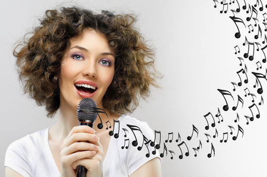 singing into a microphone
