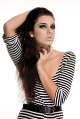 Fototapeta premium Studio shot of sensual young woman with bright make-up