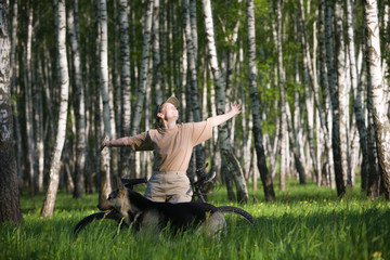 Obraz premium Woman with dog