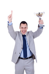 business man holding a trophy