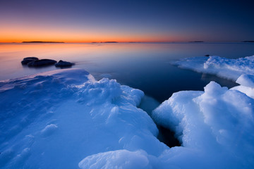 Sunrise and icy beach