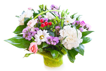 Obraz na płótnie Canvas Bright flower bouquet in basket isolated over white background