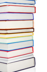 pile of new books isolated on white