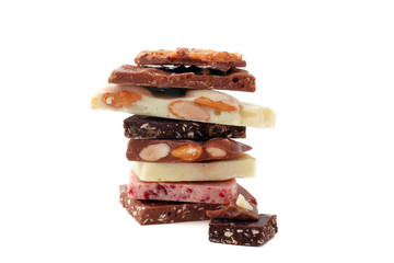 stack of pieces of different chocolate