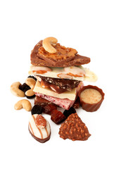 stack of pieces of сhocolate and candy isolated on white