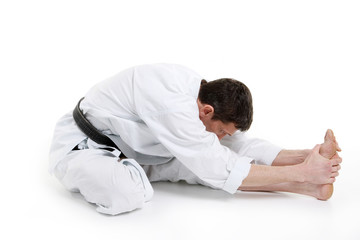 Obraz premium Karate, man in a kimono limberingup