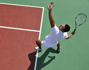 Foto op Plexiglas young man play tennis outdoor © .shock