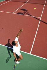 young man play tennis outdoor