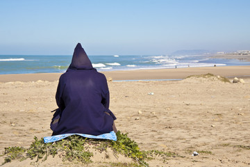 Man sitting at the beach