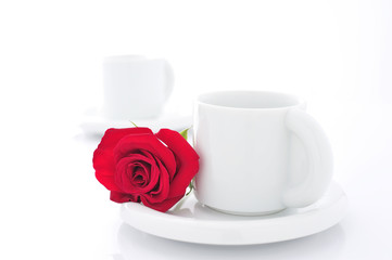 Fototapeta na wymiar コーヒーカップと薔薇