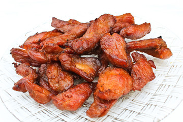 Closeup of fresh fried pork with sesame, thai food.