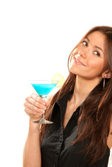 Lady holding popular blue tropical martini cocktail drink