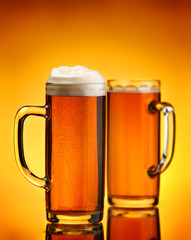 Beer beverage on yellow background