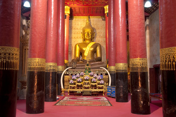 Golden Buddha statue on night at Northern, Thailand.